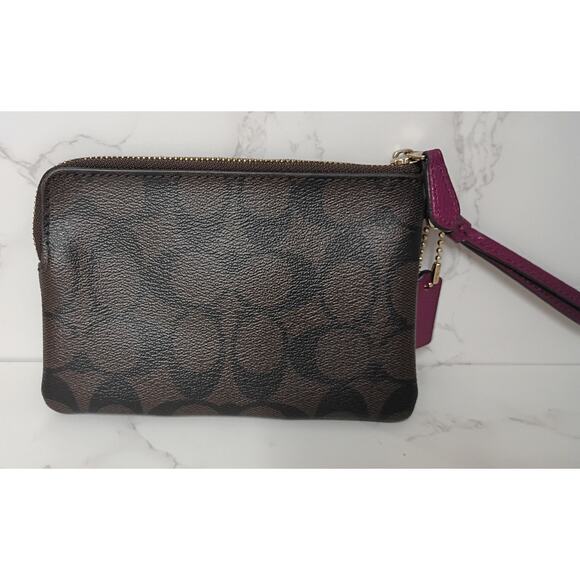 COACH Corner Zip Wristlet in Signature Canvas with Pink Accents - EUC - Picture 2 of 6